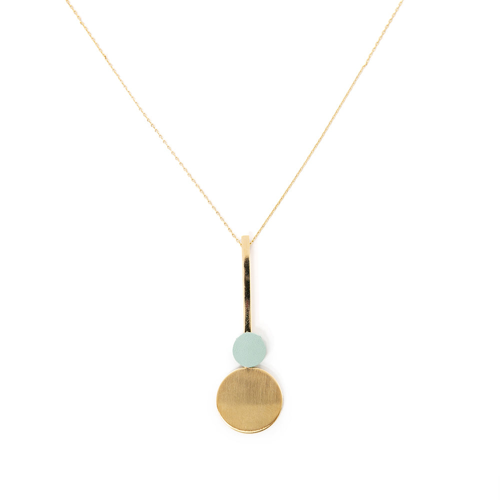 The Winona Necklace with blue and gold circular pendants 